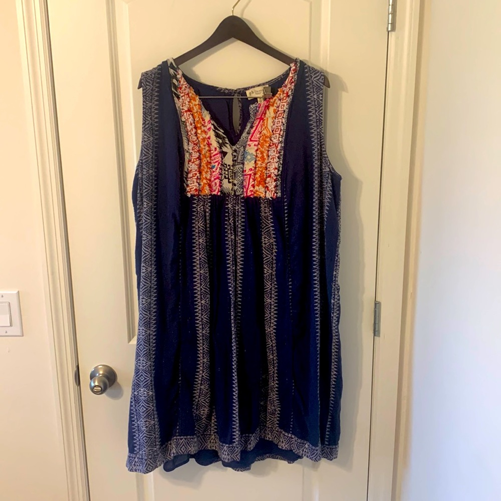 Babydoll style dress, size 2x. Navy blue with bright colors.